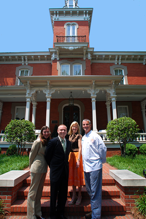 Management Team in front of Second Empire’s Historic Dodd Hinsdale House