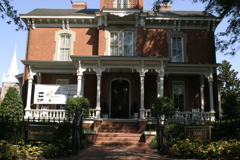 2006 Second Empire Grand Prix banner hanging on front porch of Second Empire Restaurant