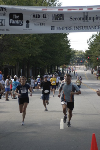 Runners getting ready to cross Finish Line at 2006 Second Empire 5K Classic
